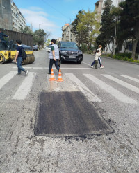 Nizami rayonunda intensiv yağıntıların yollarda yaratdığı fəsadlar aradan qaldırılır