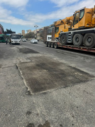 Nizami rayonunda intensiv yağıntıların yollarda yaratdığı fəsadlar aradan qaldırılır