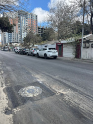 Nizami rayonunda intensiv yağıntıların yollarda yaratdığı fəsadlar aradan qaldırılır