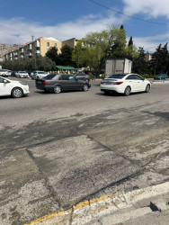 Nizami rayonunda intensiv yağıntıların yollarda yaratdığı fəsadlar aradan qaldırılır